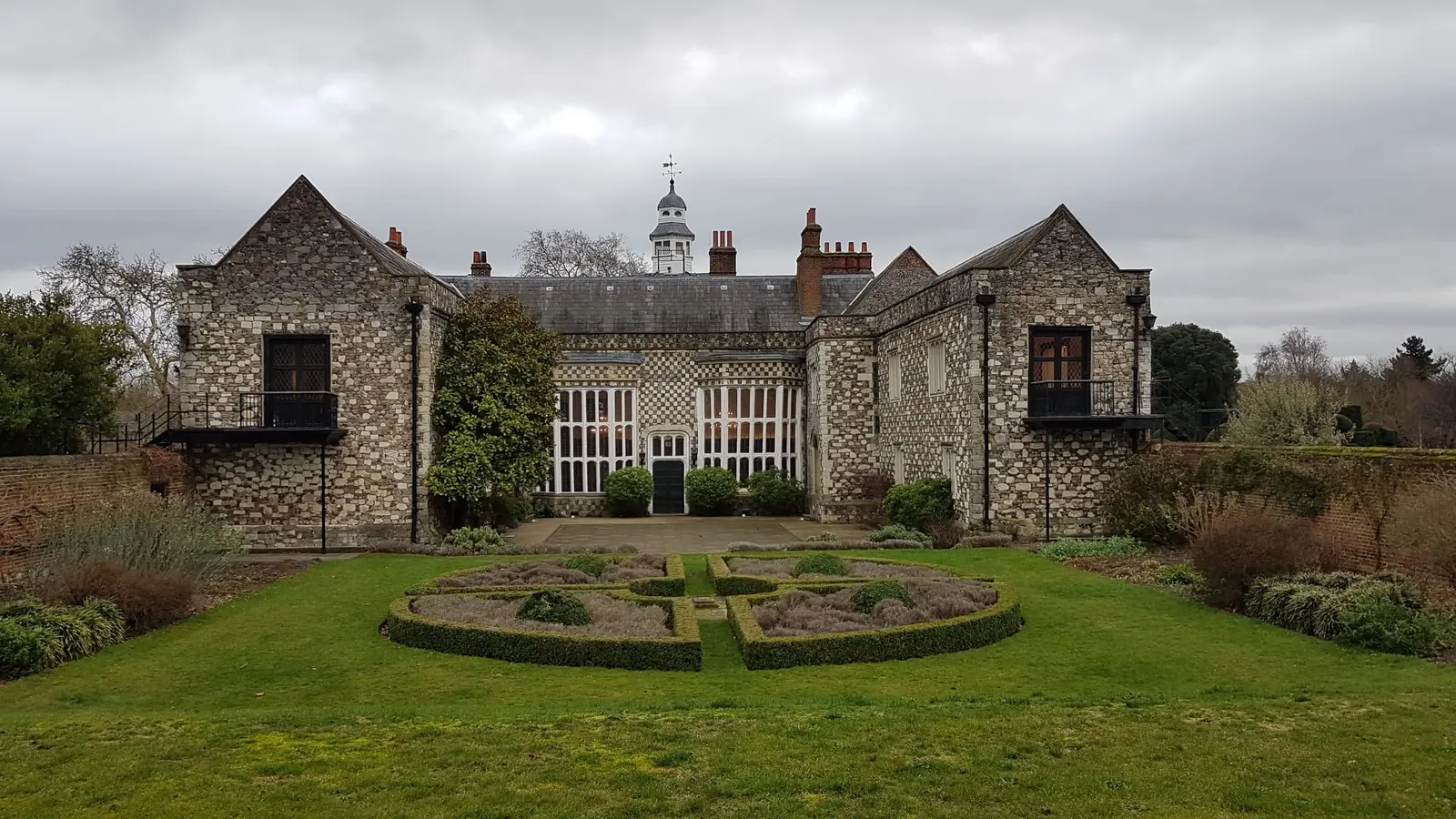 Hall Place in Bexley, a Tudor flint-and-stone house behind formal gardens