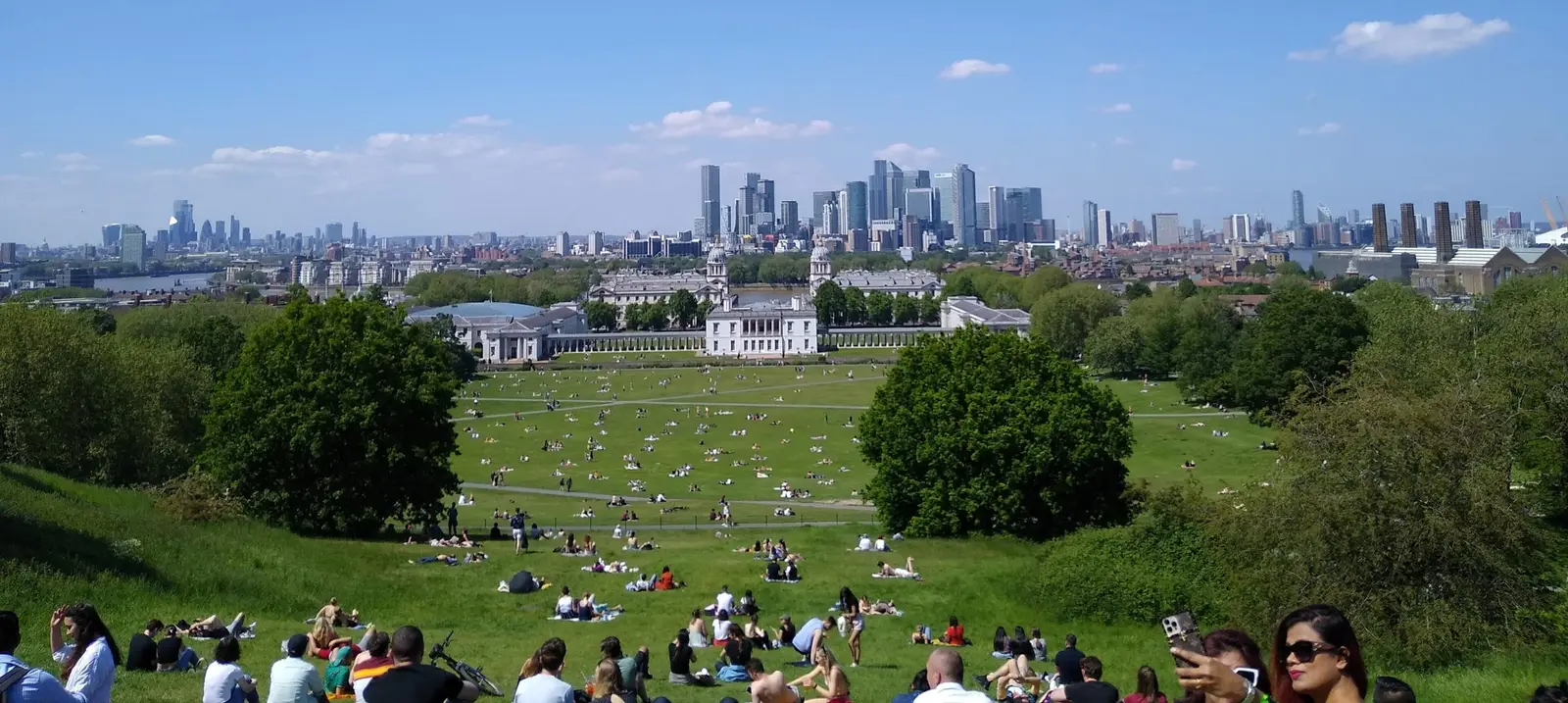 Greenwich Park’s lawns from the Royal Observatory, with Canary Wharf on the skyline