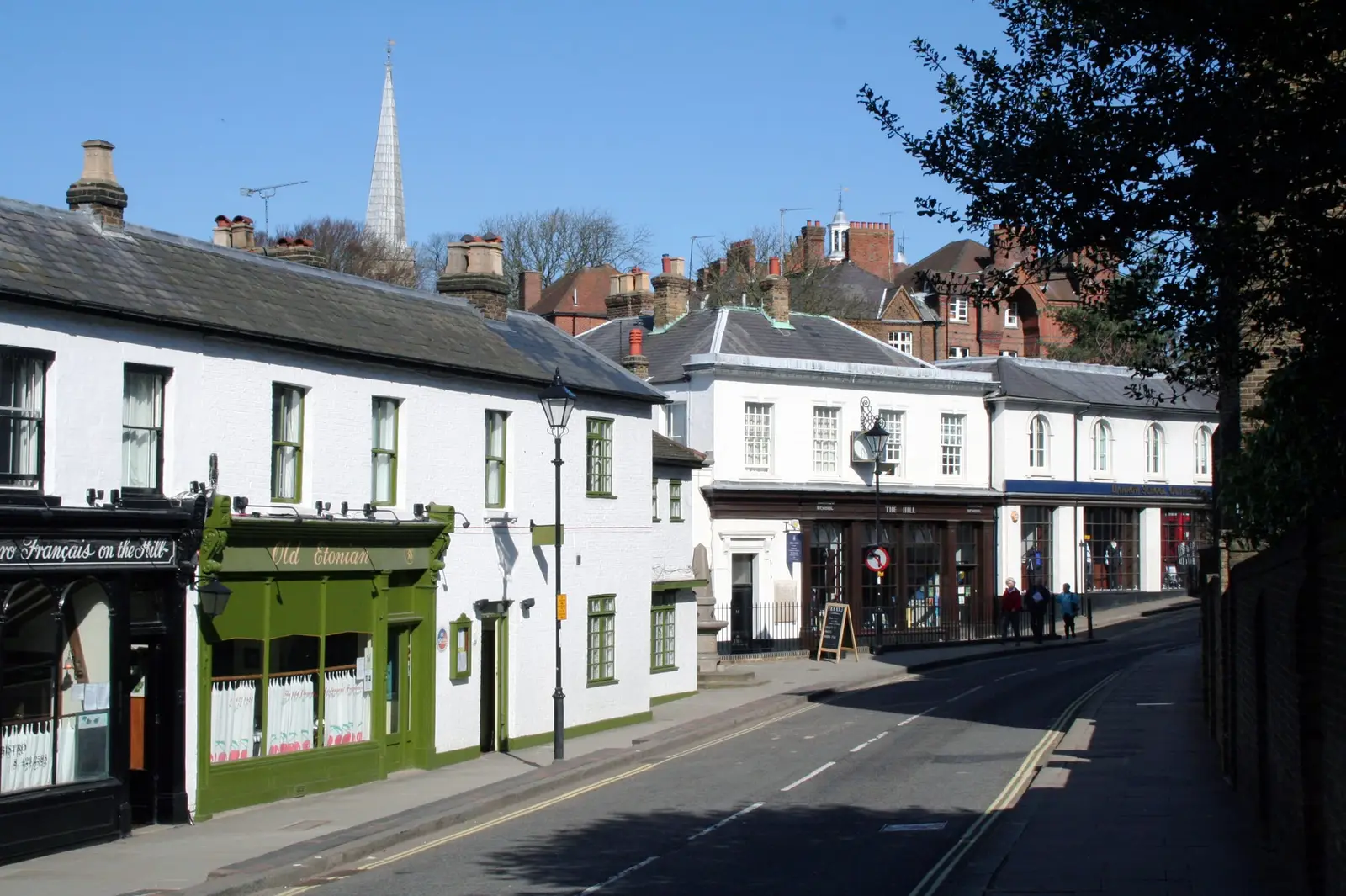 Harrow on the Hill High Street with old houses and a church spire