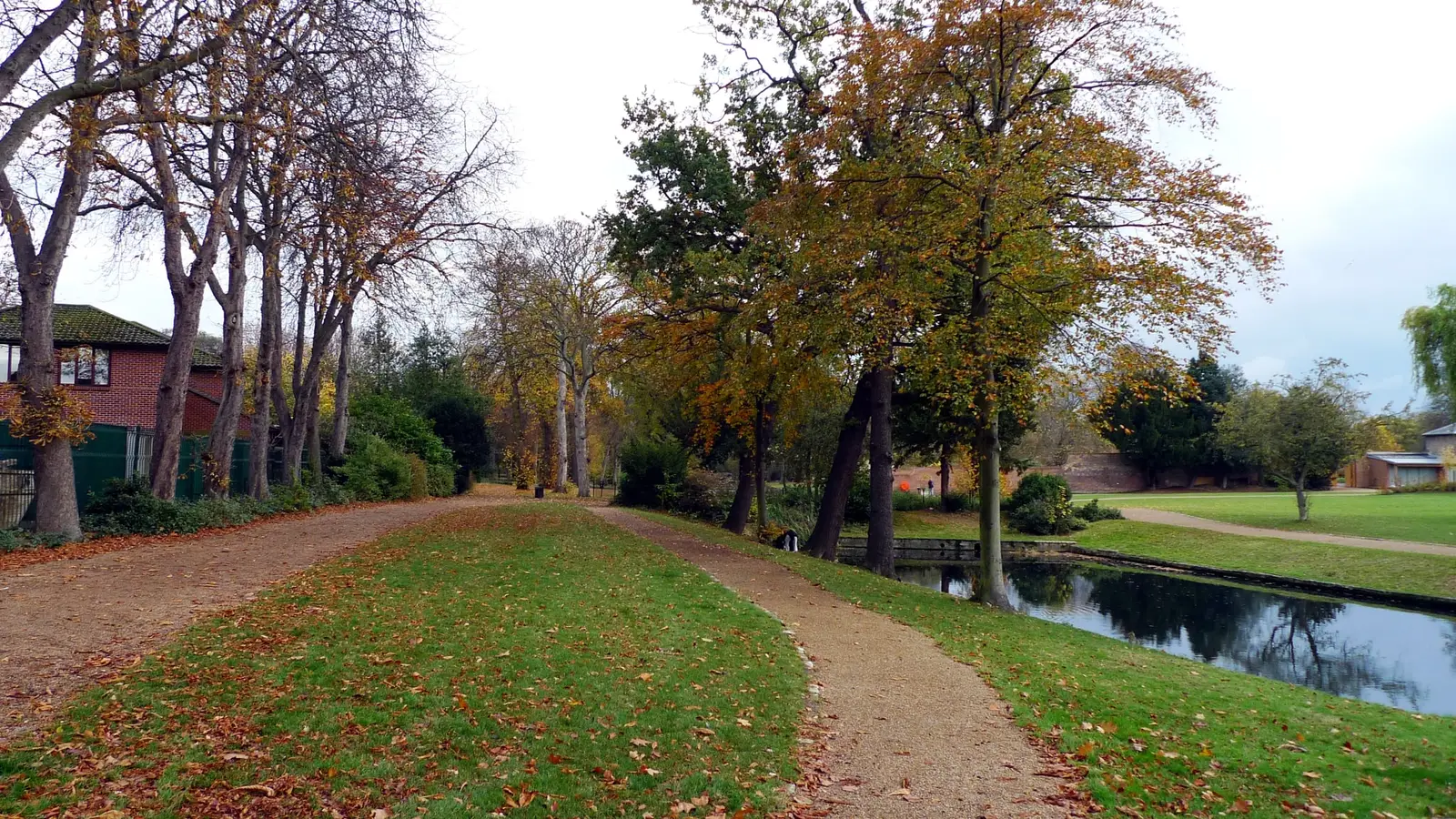 A tree-lined path into Valentines Park, Ilford