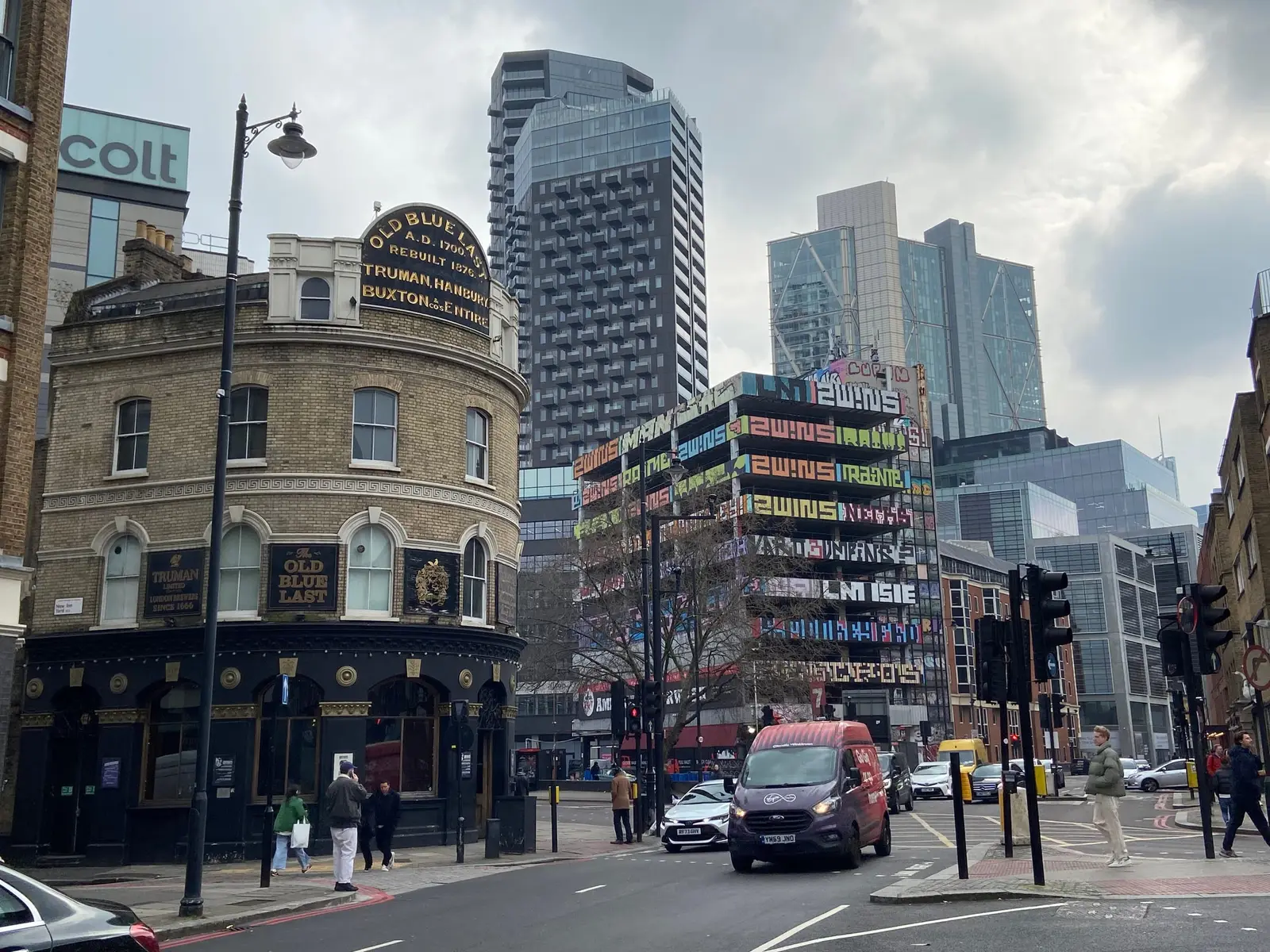Curtain Road in Shoreditch: Victorian pubs and offices with new towers beyond