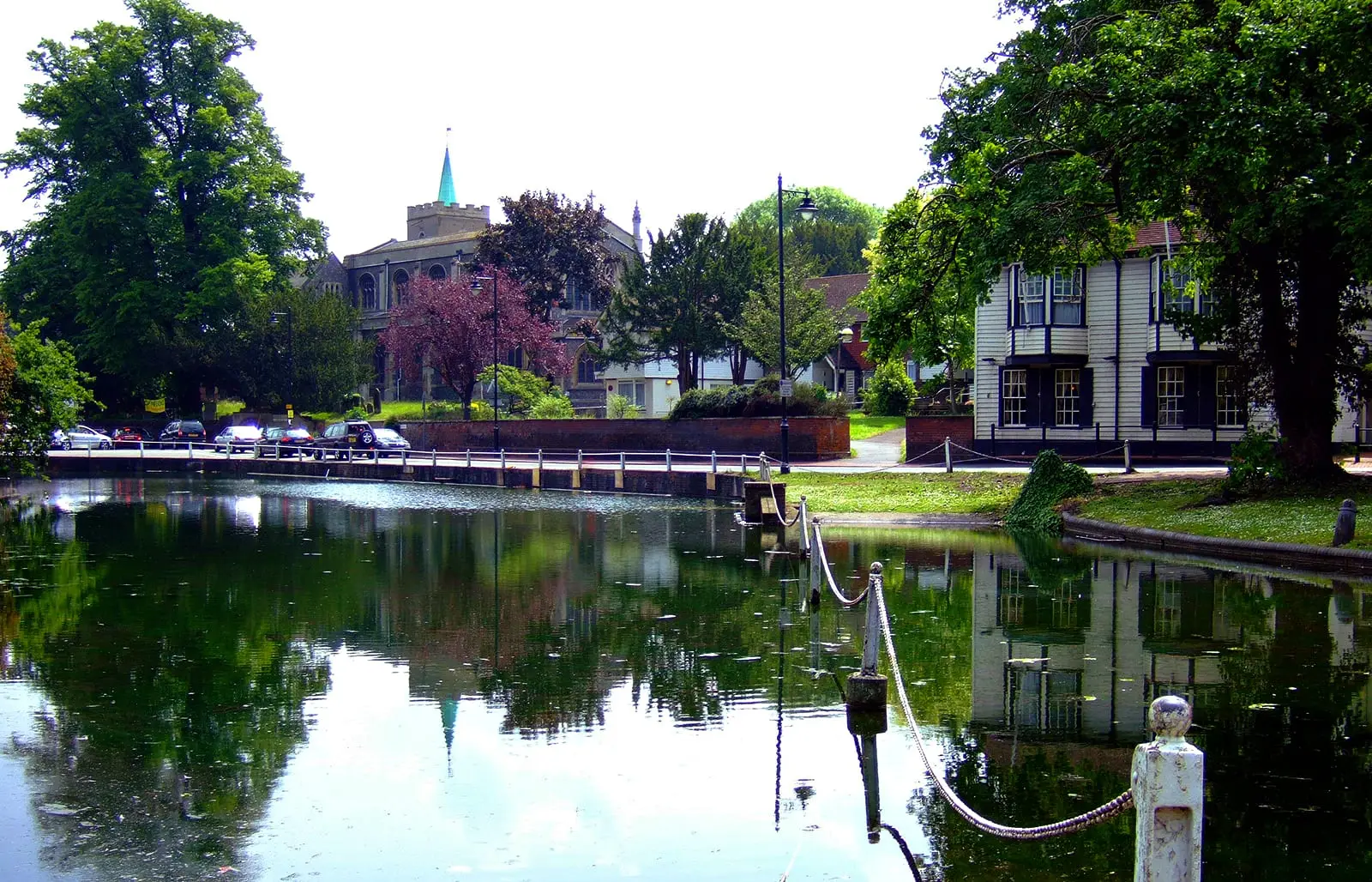 Carshalton Upper Pond with All Saints Church behind the trees